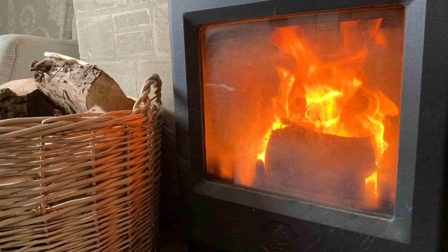 close up of log burner lit by grenadier firelighter